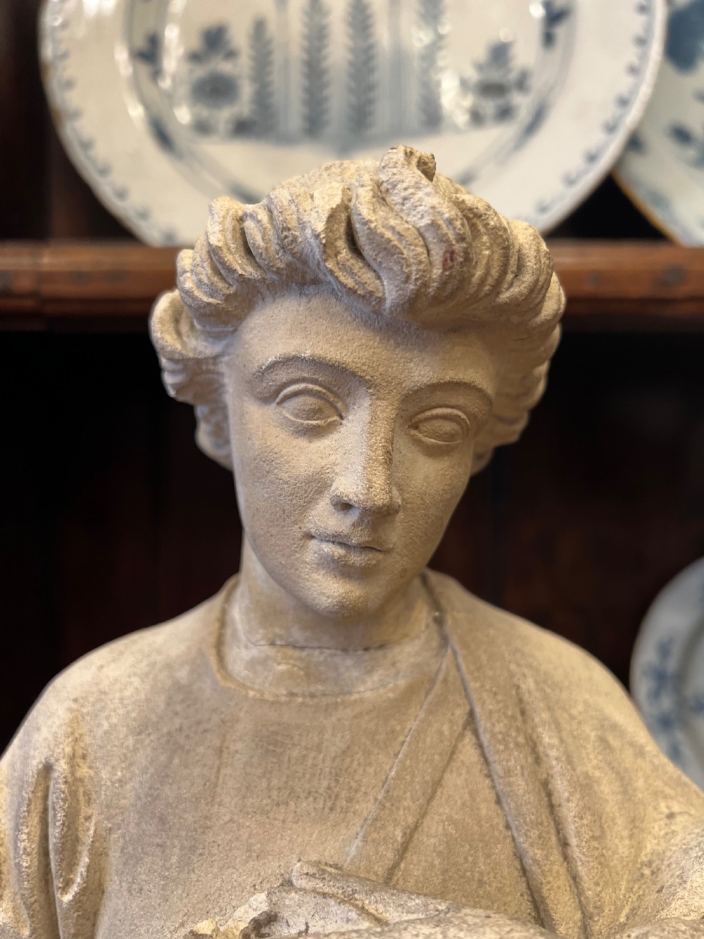 A large C19th limestone carving of St Paul  View X