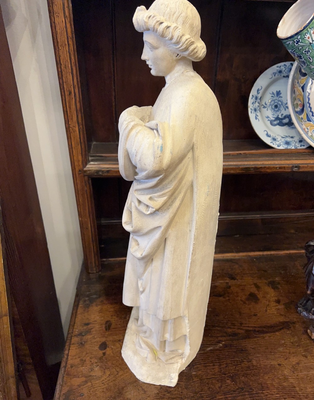 A large C19th limestone carving of St Paul  View XI
