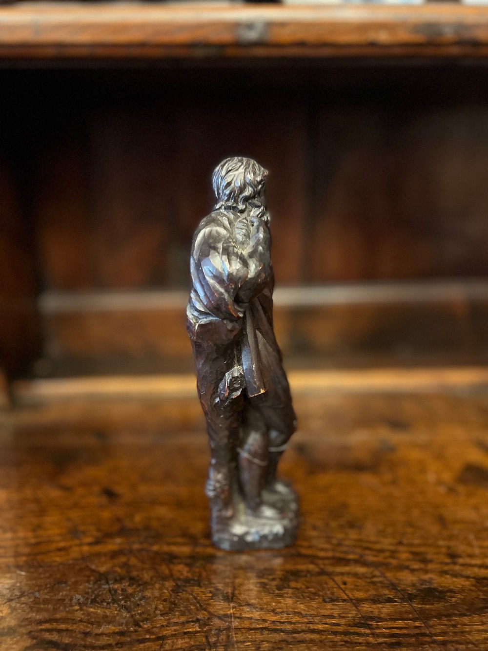 Small C18th carved figure of a saint View III