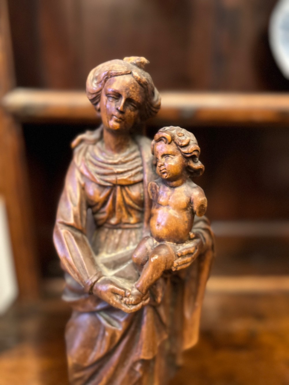 C18th lime wood carved figure of Madonna and child  View II