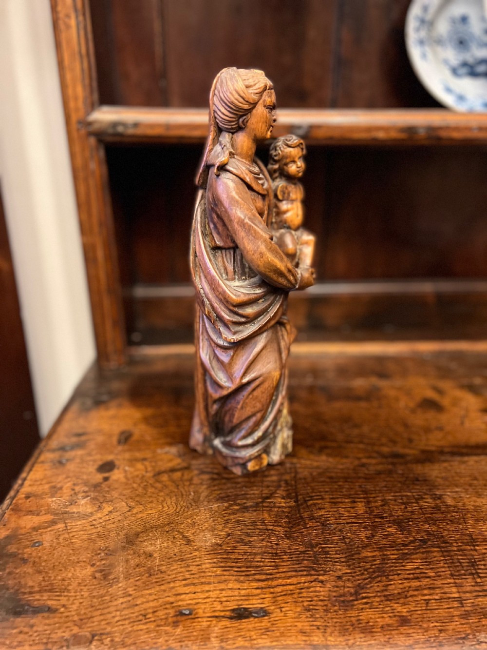 C18th lime wood carved figure of Madonna and child  View V