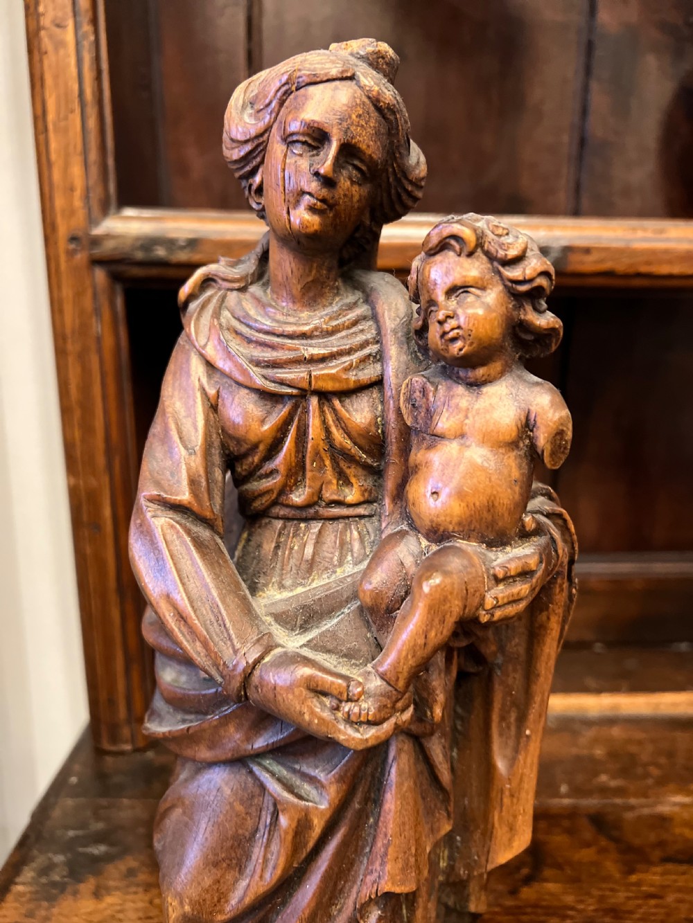 C18th lime wood carved figure of Madonna and child  View VIII