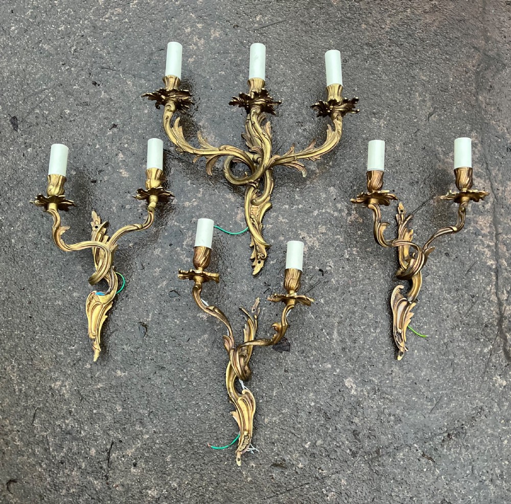 Set of four wall lights in the rococo taste 