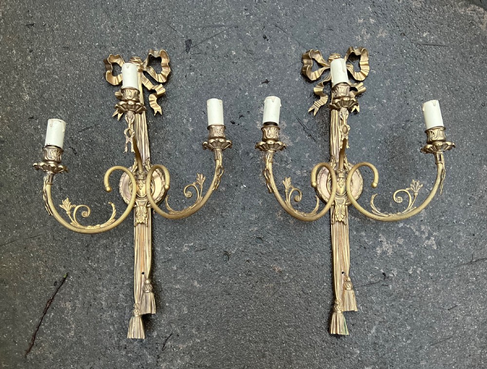 Pair of large classical style wall lights 