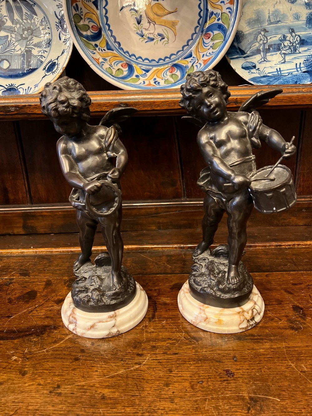Pair of bronze cherub musicians on marble bases  View II