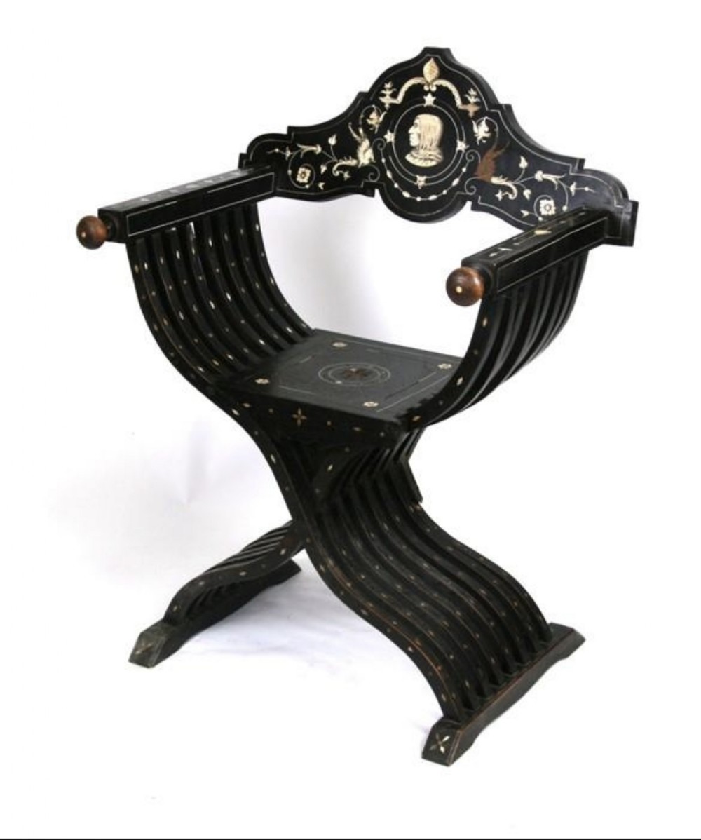 A C19th Italian ebonised savaronola chair in the manner of Ferdinand pogliani 