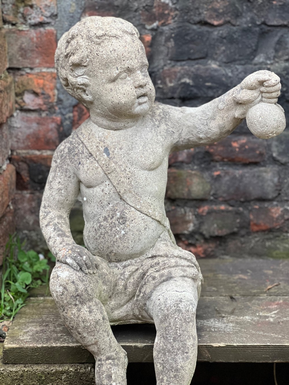 Large pair of putti holding aloft fruit  View II