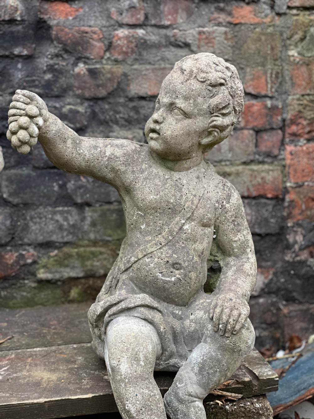 Large pair of putti holding aloft fruit  View V