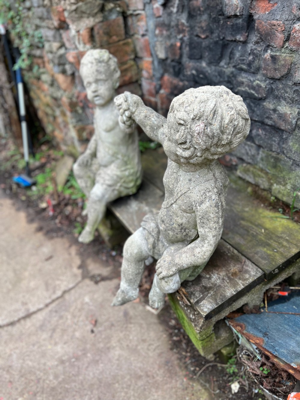 Large pair of putti holding aloft fruit  View VII