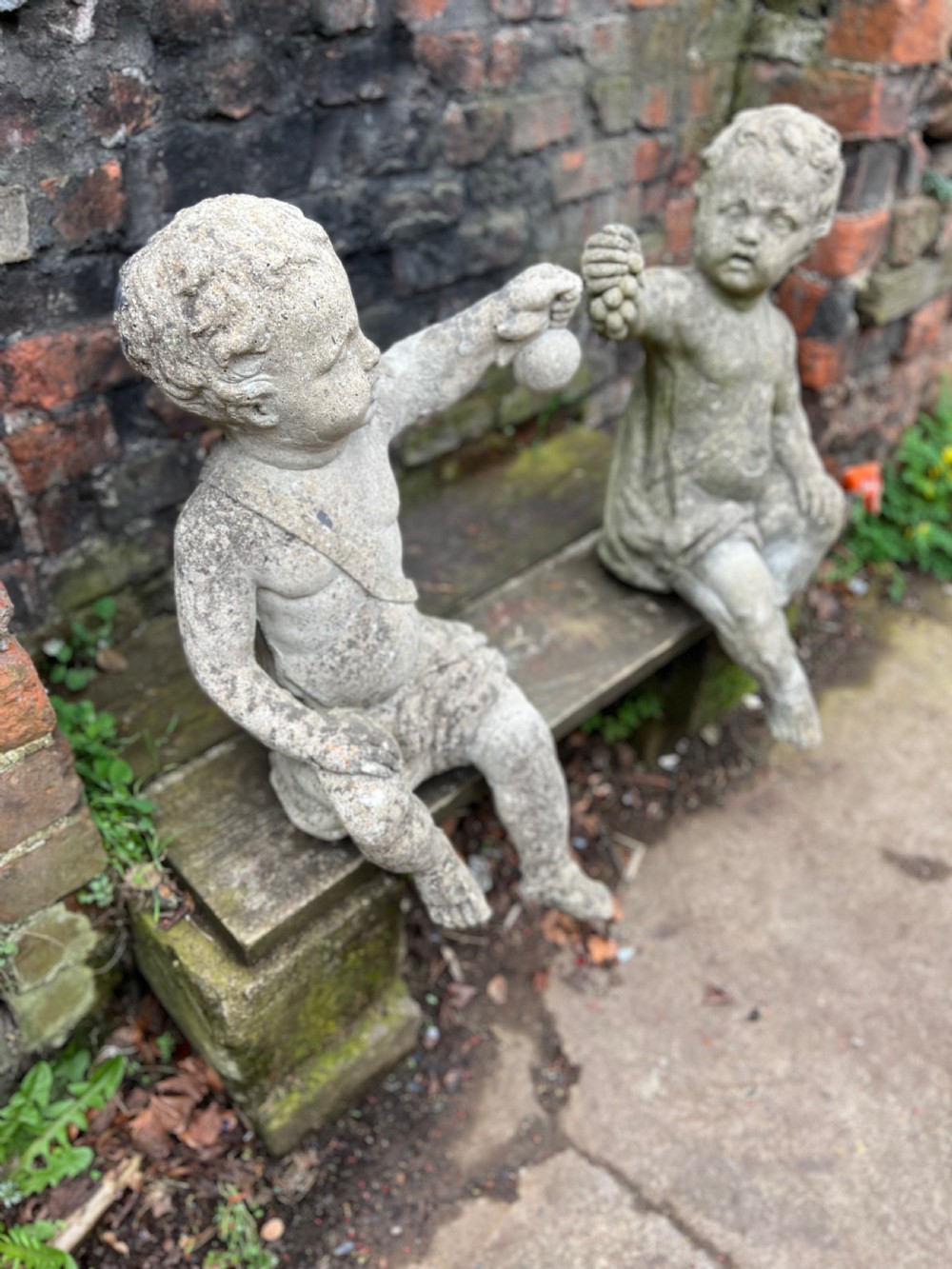 Large pair of putti holding aloft fruit  View VIII