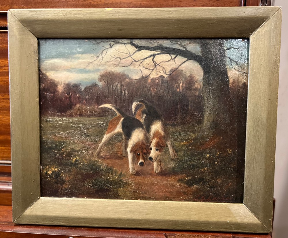 Oil painting on board by ES England ( act 1890-1910) two fox hounds 