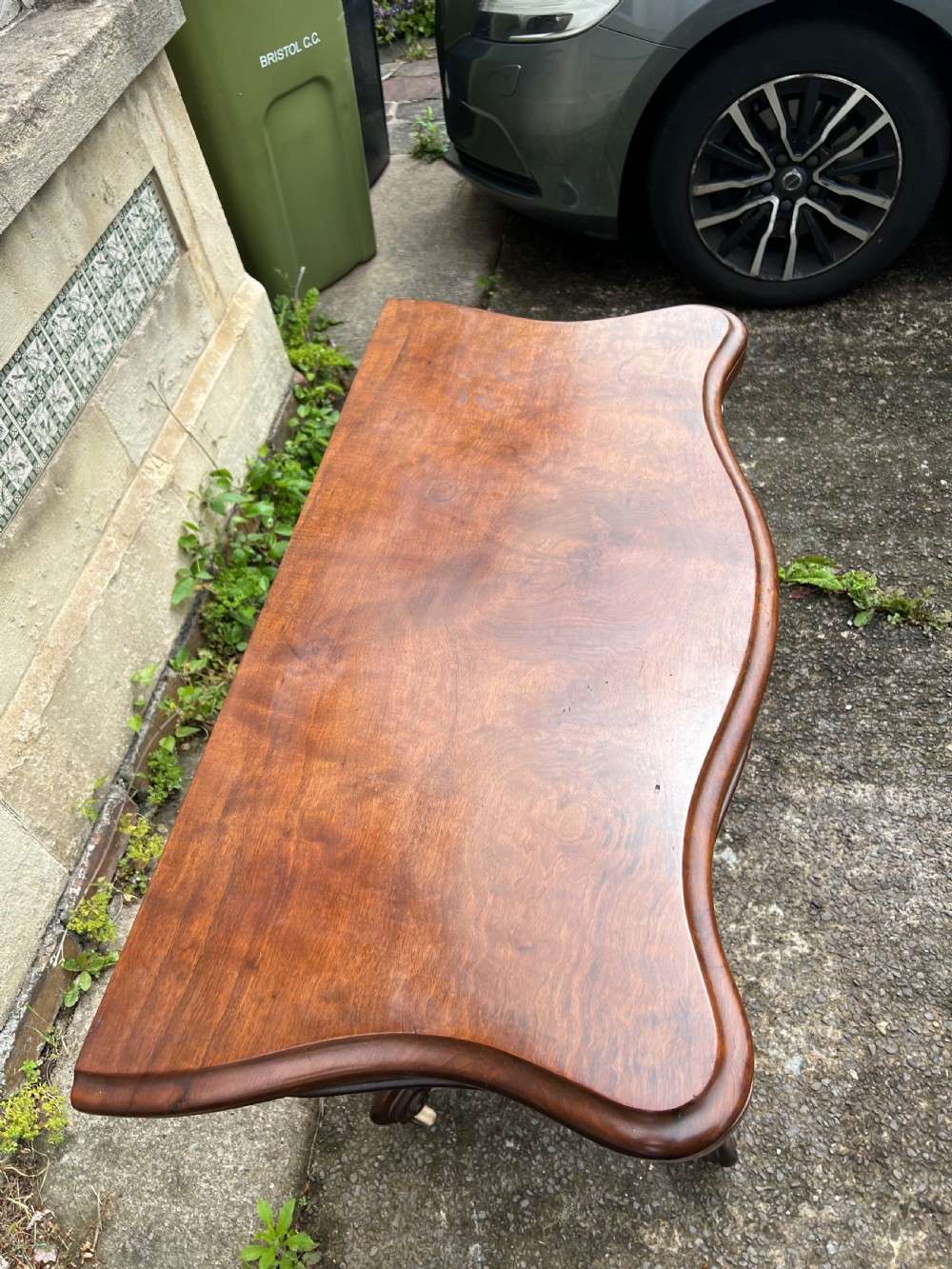 C19th serpentine mahogany pedestal card table  View III