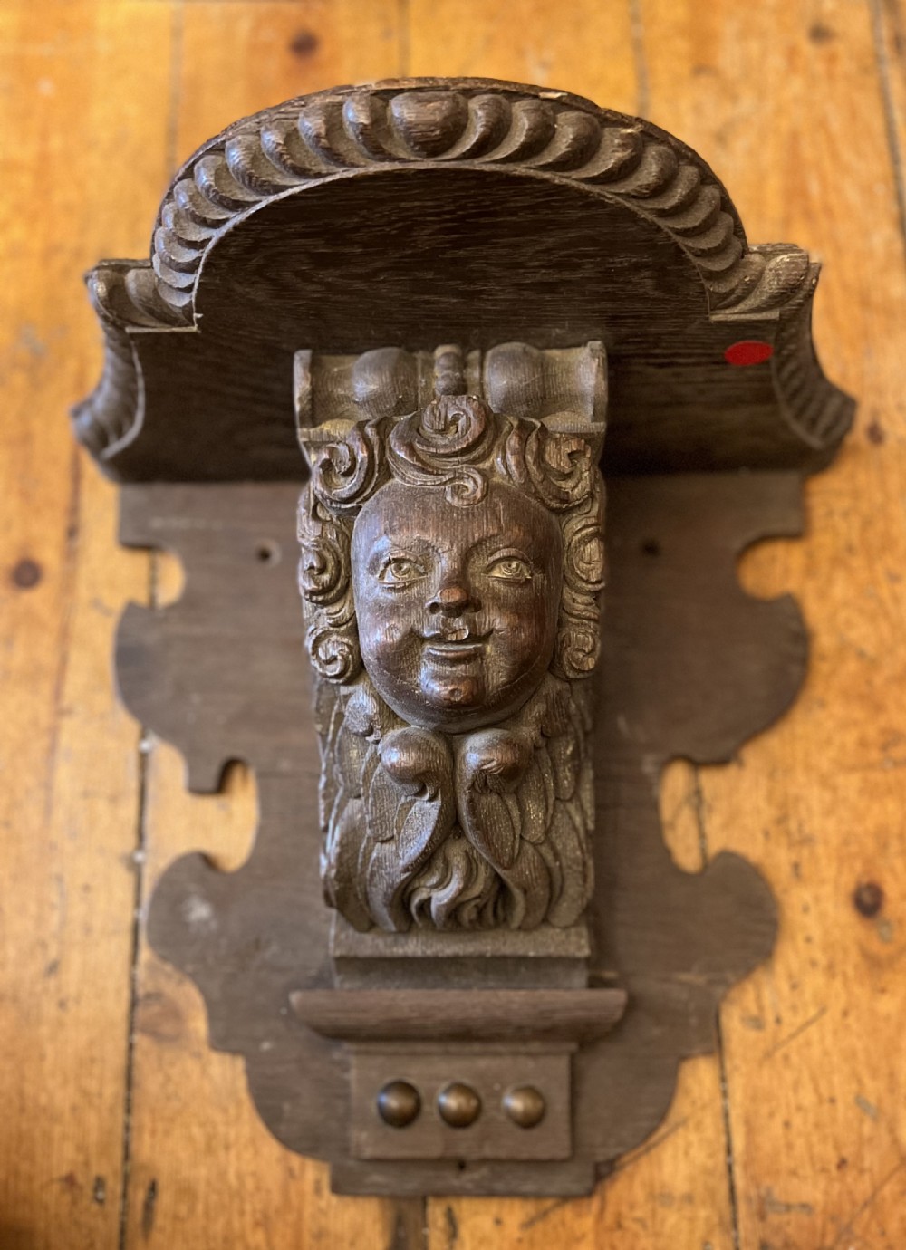 C18th carved Cherub corbel in oak 