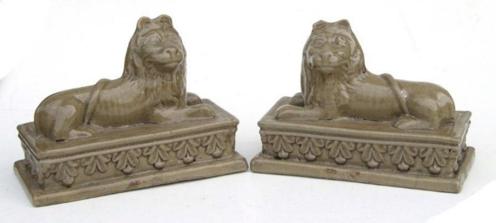 C19th pair of pottery lions 
