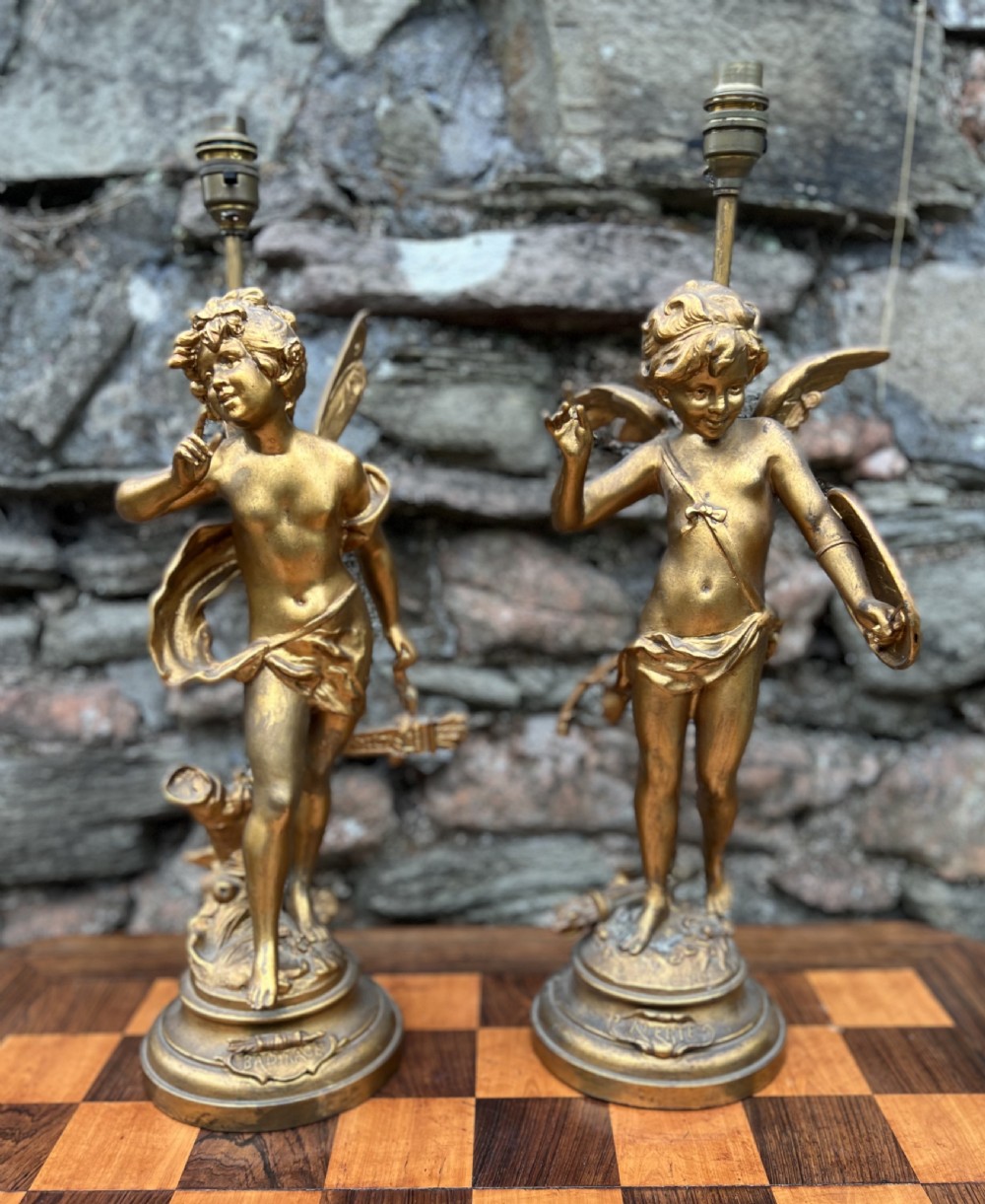 Pair of table lamps modelled as Cupid and psyche 