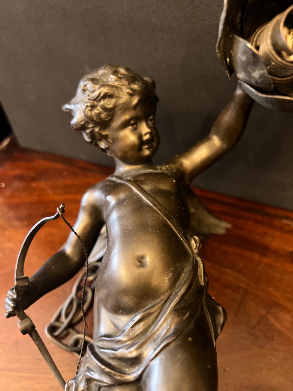 Pair of bronze cupids modelled as ceiling lights  View II