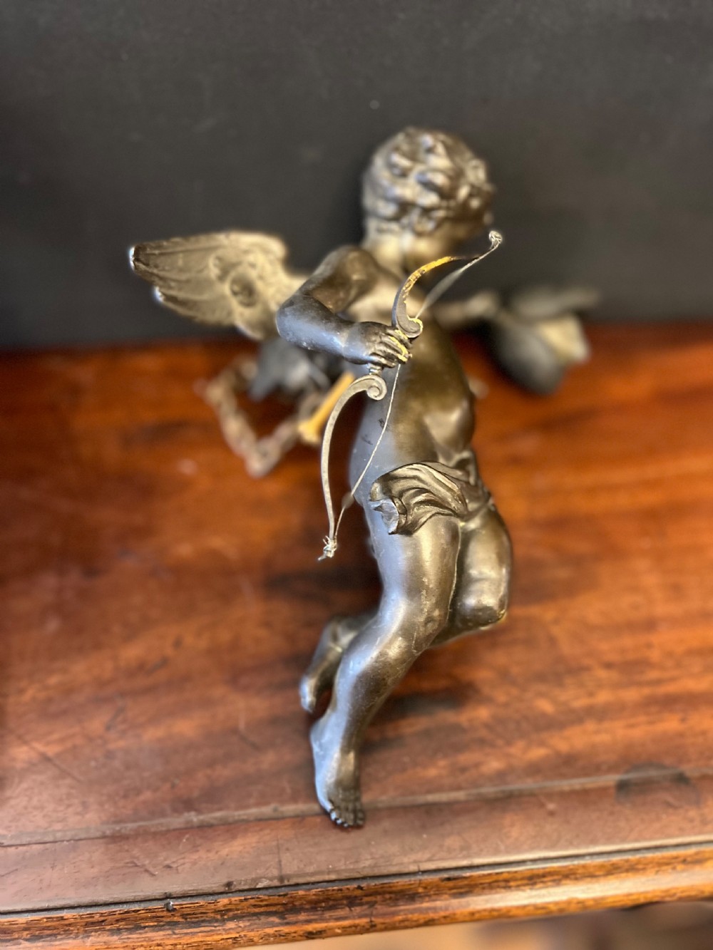 Pair of bronze cupids modelled as ceiling lights  View III