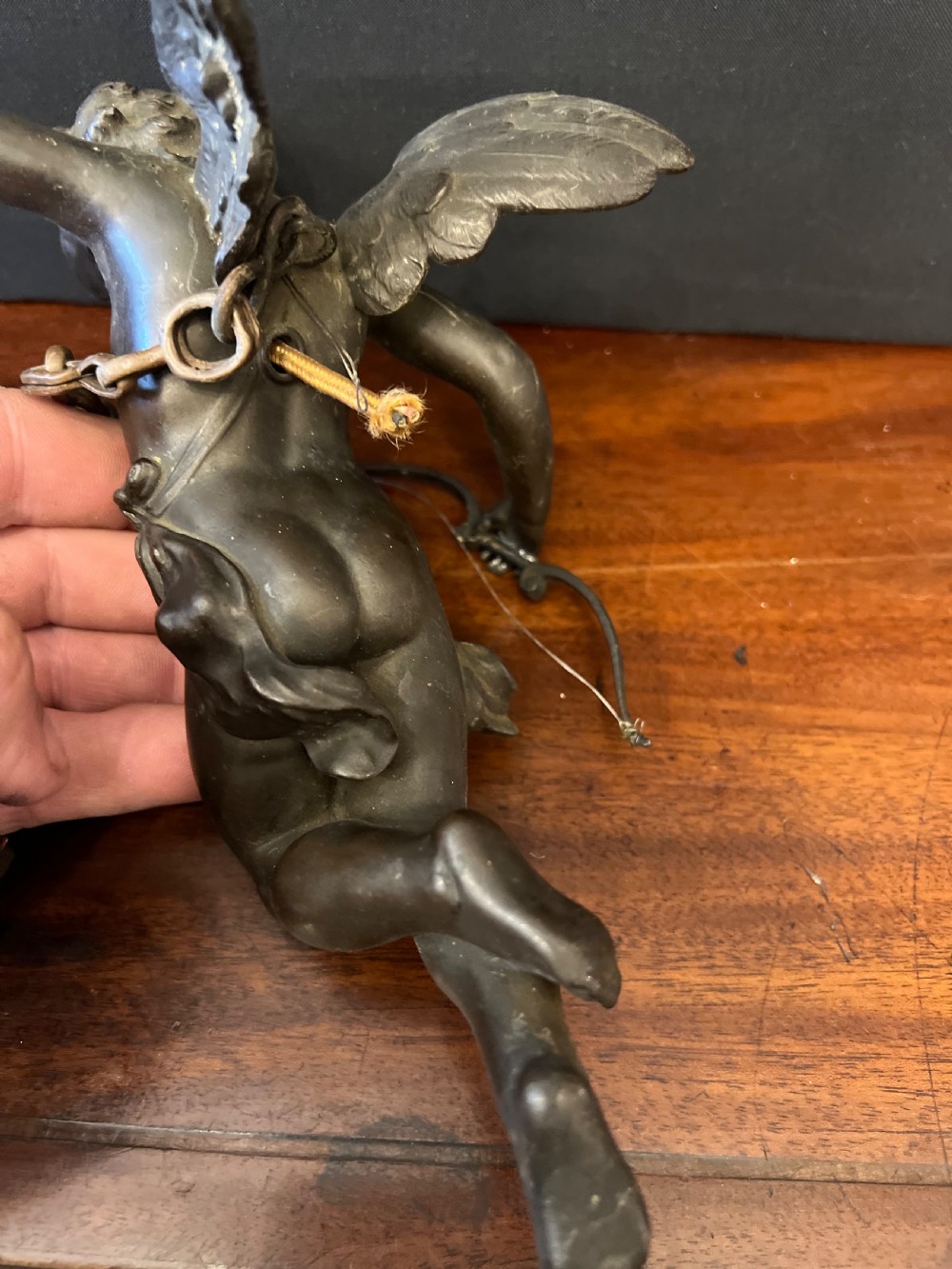 Pair of bronze cupids modelled as ceiling lights  View VI