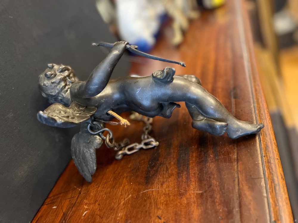 Pair of bronze cupids modelled as ceiling lights  View VII