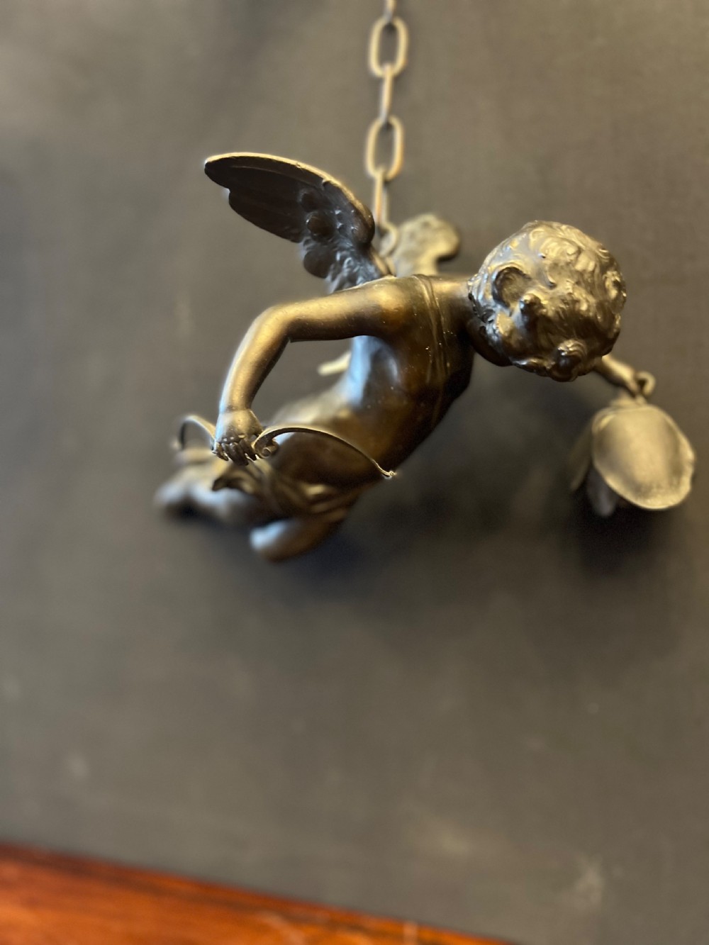 Pair of bronze cupids modelled as ceiling lights  View IX