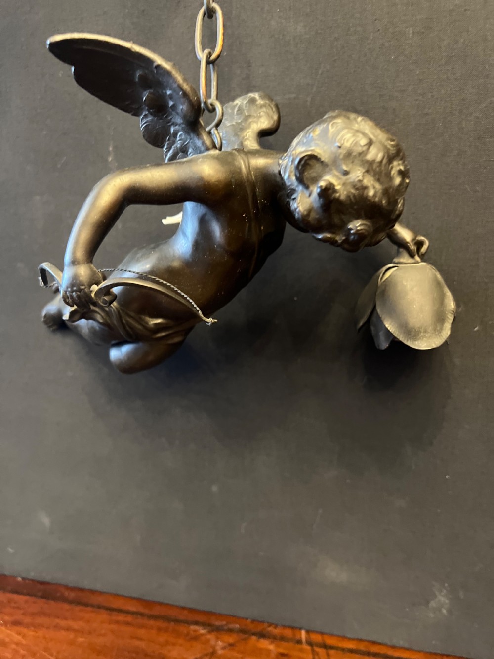 Pair of bronze cupids modelled as ceiling lights  View X