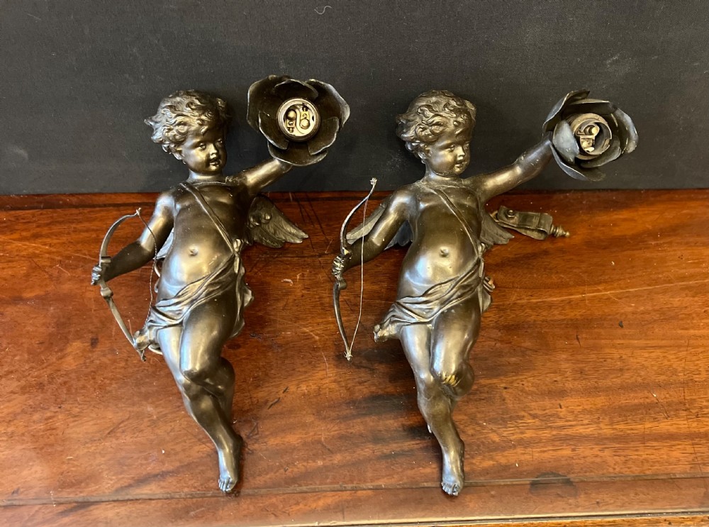 Pair of bronze cupids modelled as ceiling lights  View XI