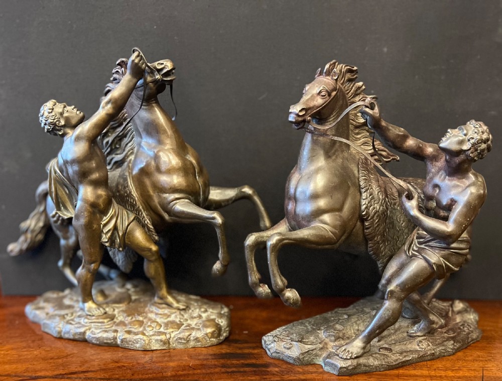 Pair of bronze Marley horses and trainers after coustou C1900