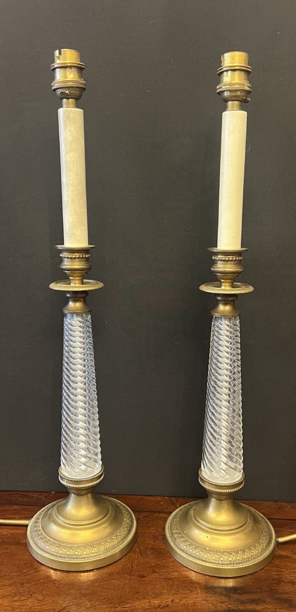 Pair of empire style glass and brass table lamps 