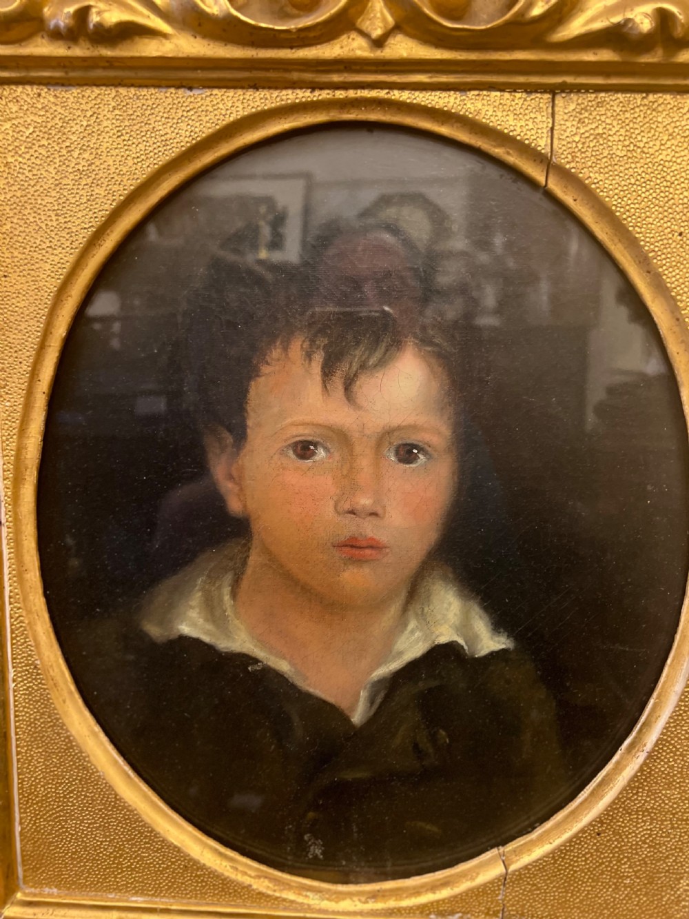 Georgian portrait oil on canvas of a young boy in carved giltwood frame  View IV