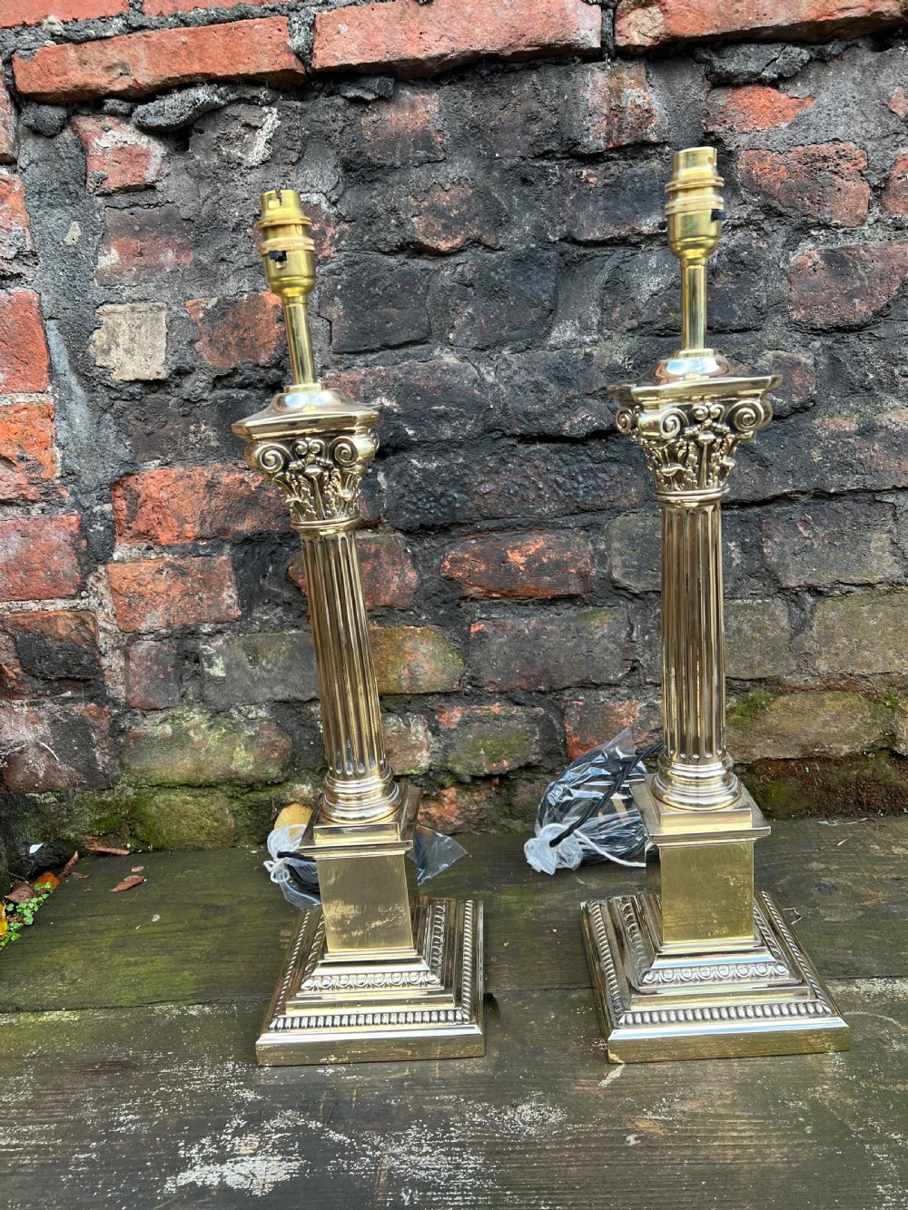 A large size pair of brass Corinthian column table lamps  View II