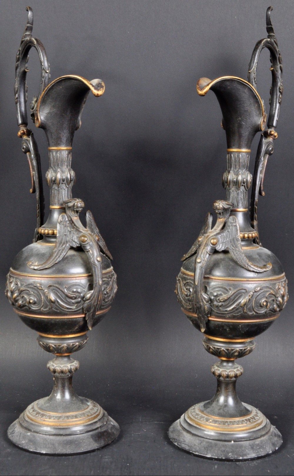 Large pair of bronze and gilt ewers 