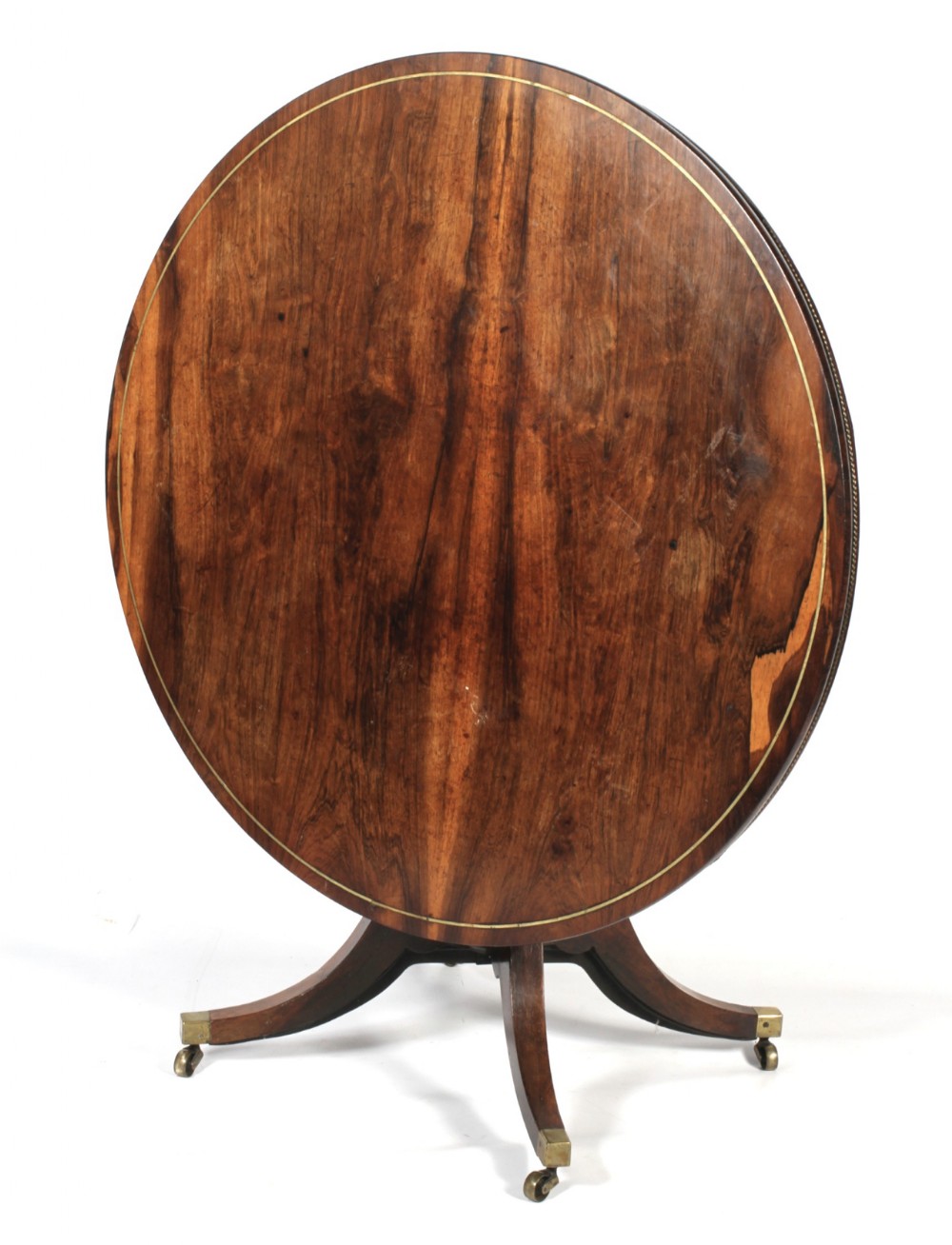 A fine Rosewood and brass circular breakfast or centre table 