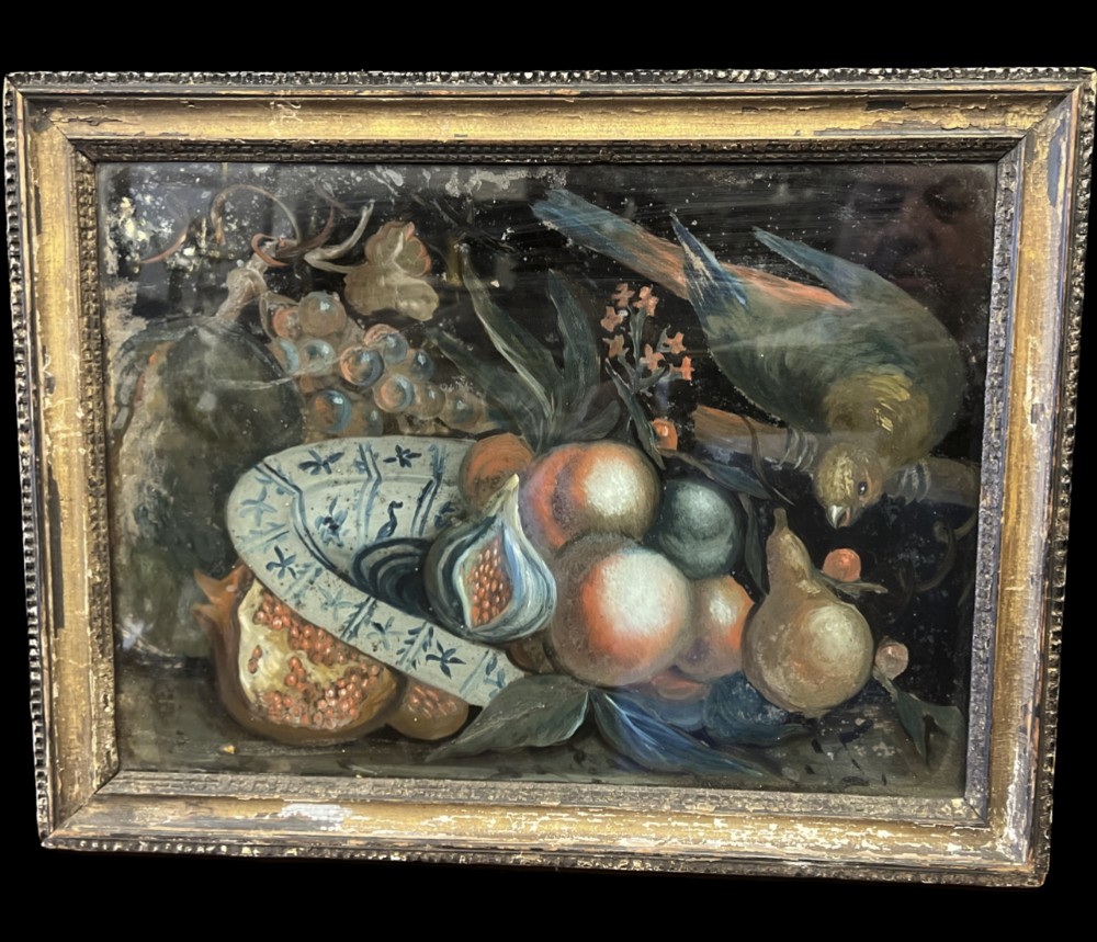 C18th Reverse glass painting of a still life 