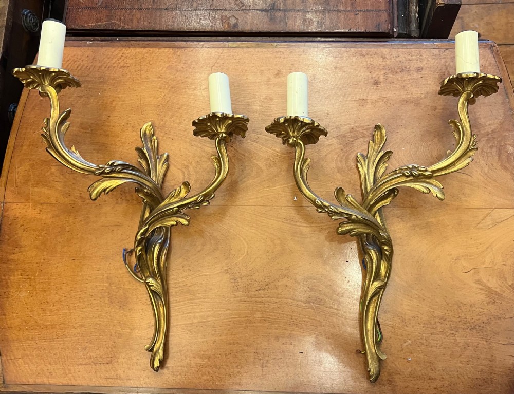 Pair of rococo brass wall lights 