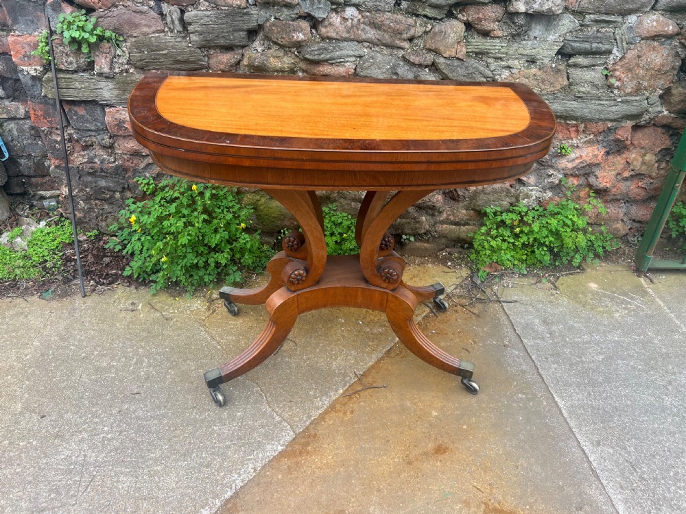 A regency tea table mahogany and yew wood inlaid top 