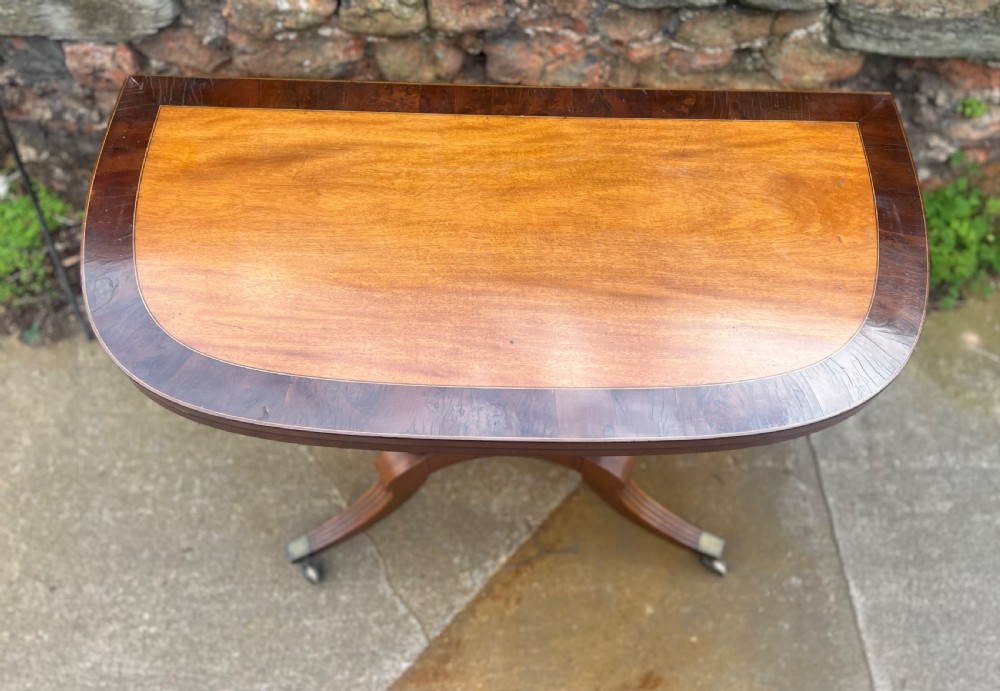 A regency tea table mahogany and yew wood inlaid top  View III