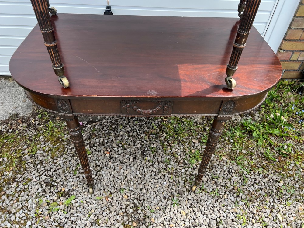 A pair of c1800 D end tables with ribbon swag carving and paterae View III