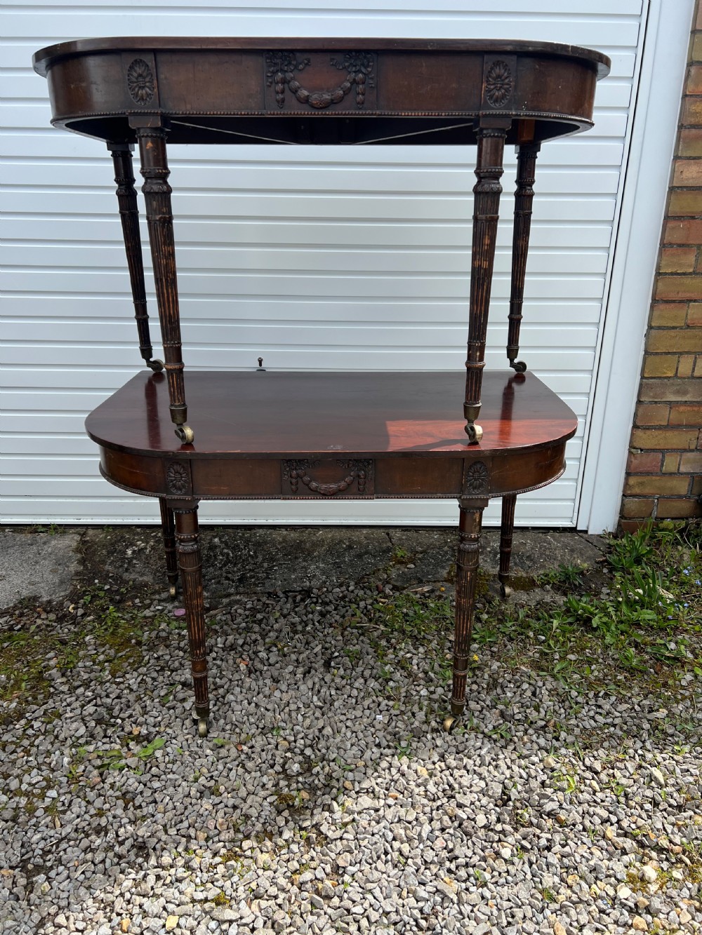 A pair of c1800 D end tables with ribbon swag carving and paterae View VII