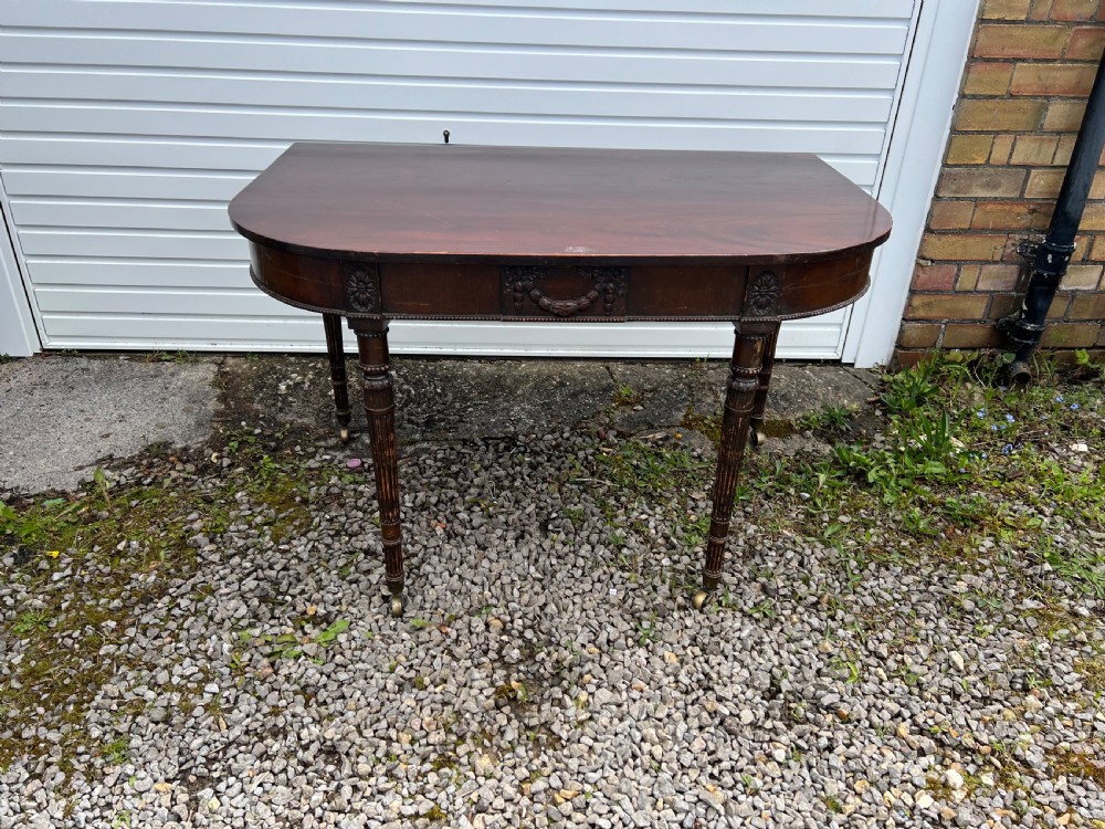 A pair of c1800 D end tables with ribbon swag carving and paterae View VIII