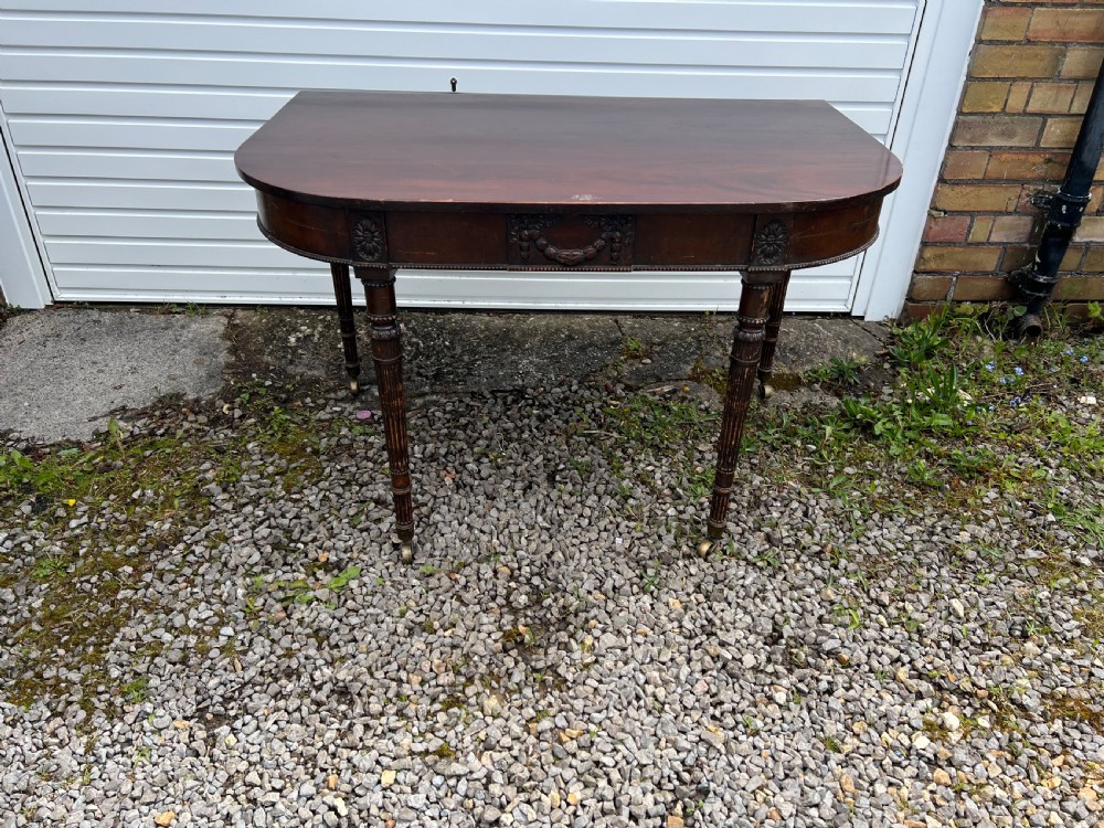 A pair of c1800 D end tables with ribbon swag carving and paterae View IX