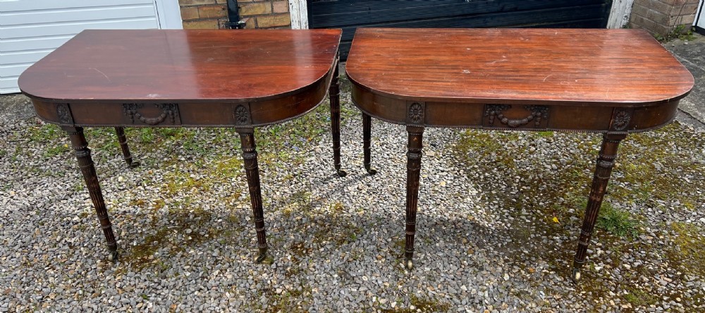 A pair of c1800 D end tables with ribbon swag carving and paterae View XIII