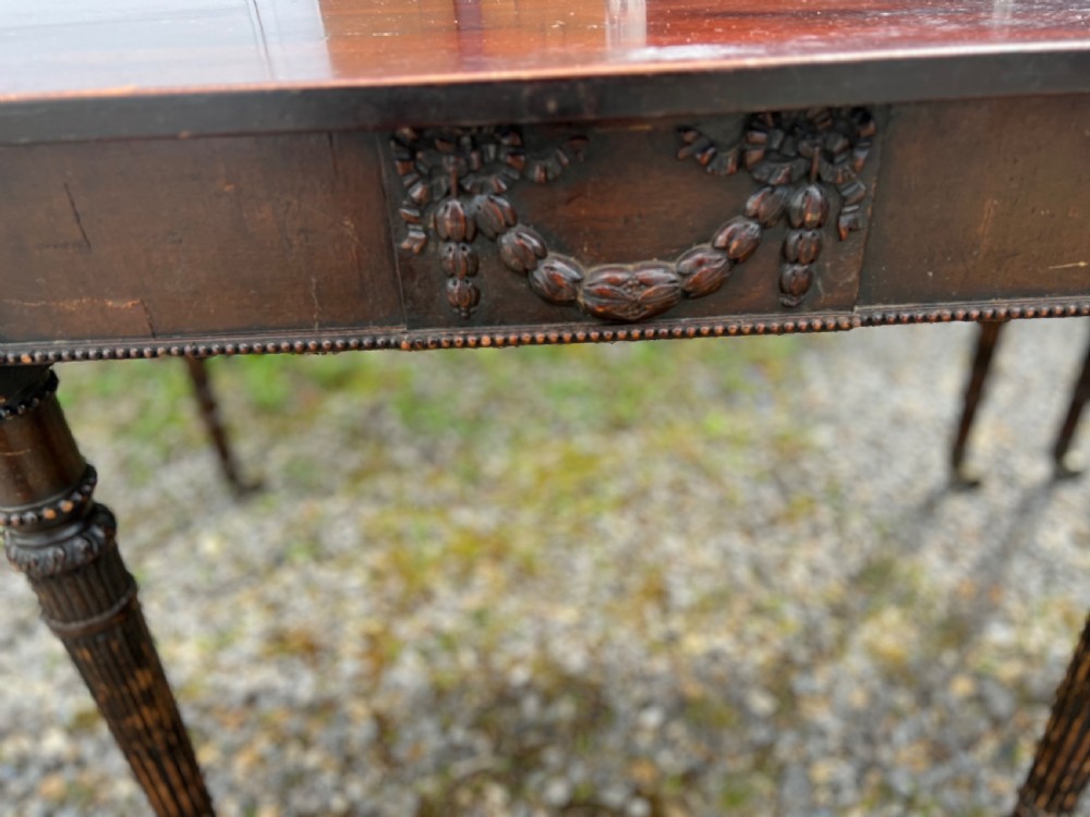 A pair of c1800 D end tables with ribbon swag carving and paterae View XIV
