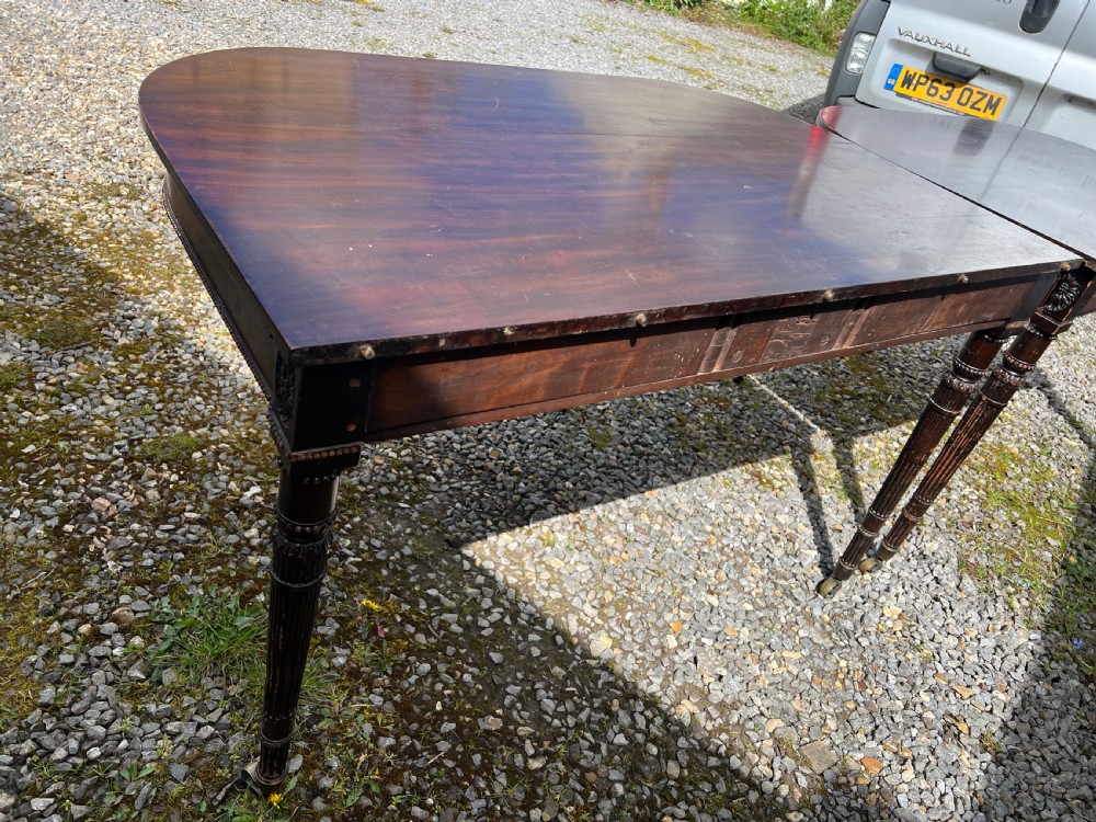A pair of c1800 D end tables with ribbon swag carving and paterae View XX