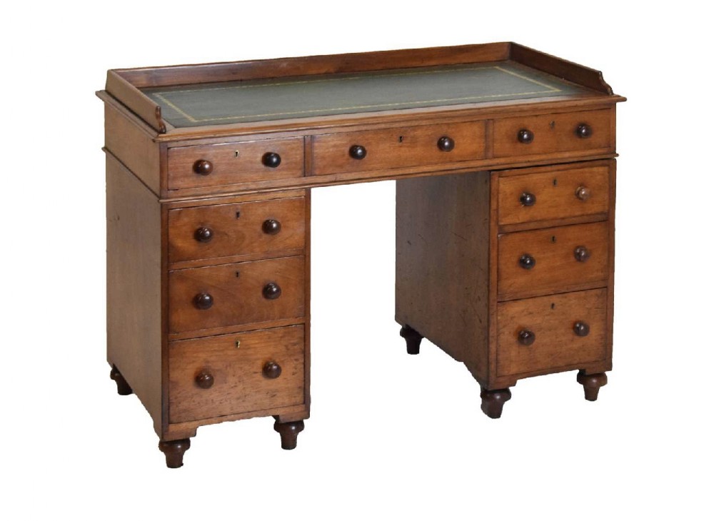 C19th campaign twin pedestal nine drawer desk 