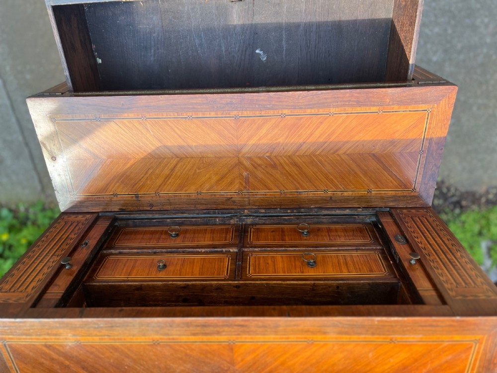 An 18th-century French bonheur de jour desk in warm brown inlaid wood, featuring square tapered legs, a single drawer with a tassel key, and a top cabinet with a pierced brass gallery. View XII