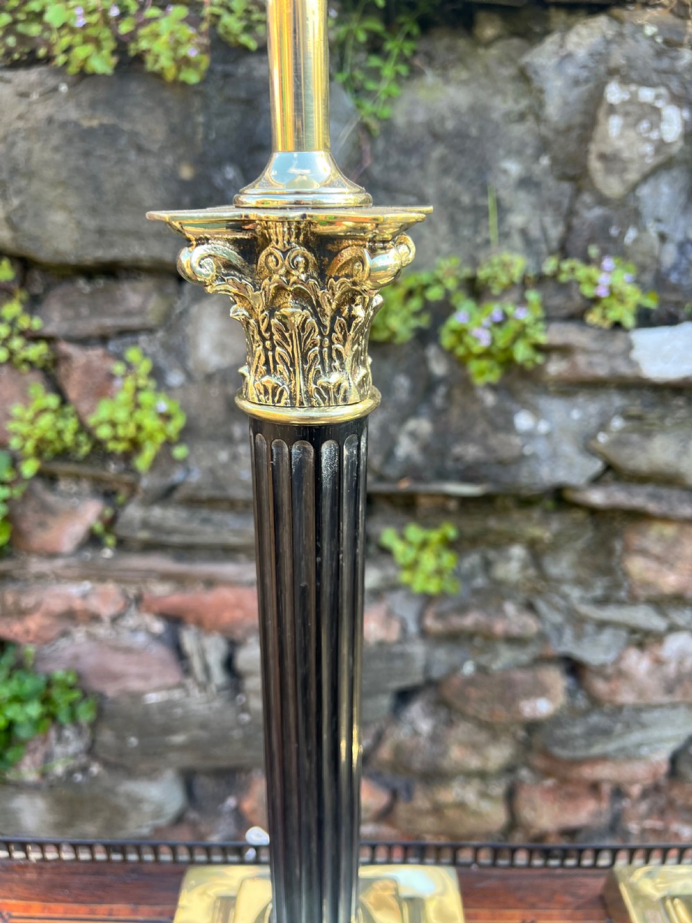 Near pair of Corinthian wooden and brass table lamps  View II