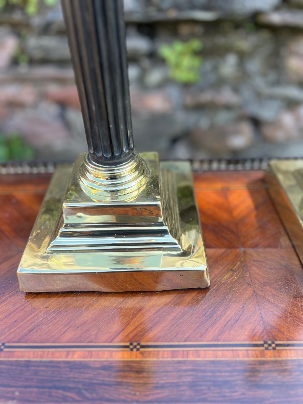 Near pair of Corinthian wooden and brass table lamps  View IV
