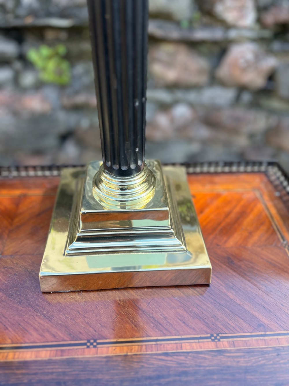 Near pair of Corinthian wooden and brass table lamps  View V