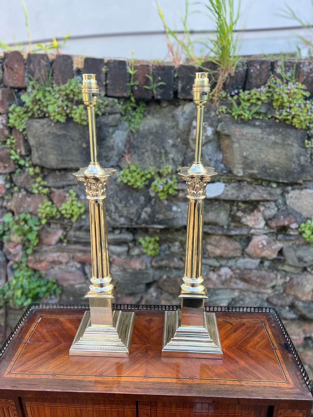 Pair of brass Corinthian column lamps  View III