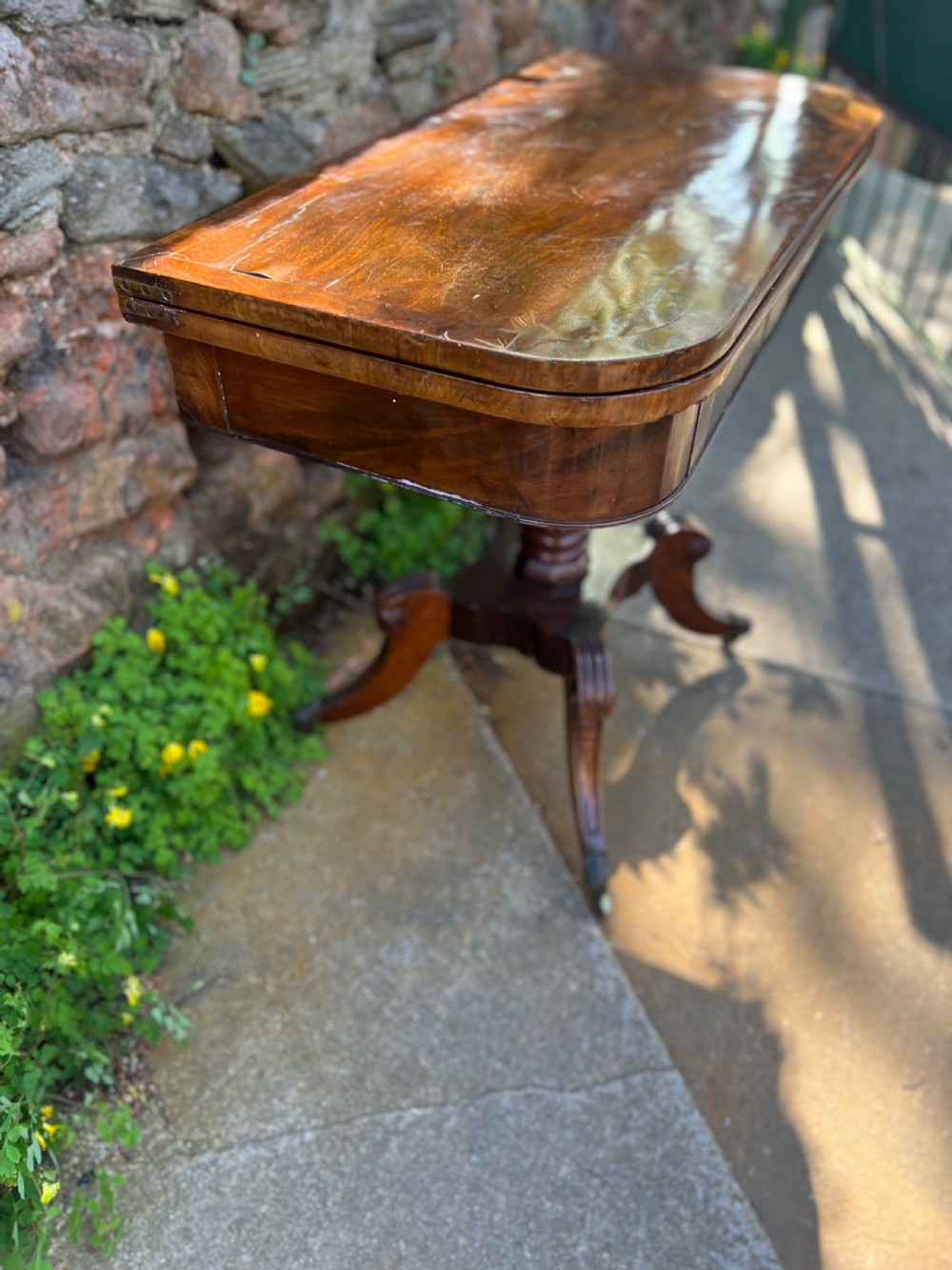 A regency mahogany card table  View V